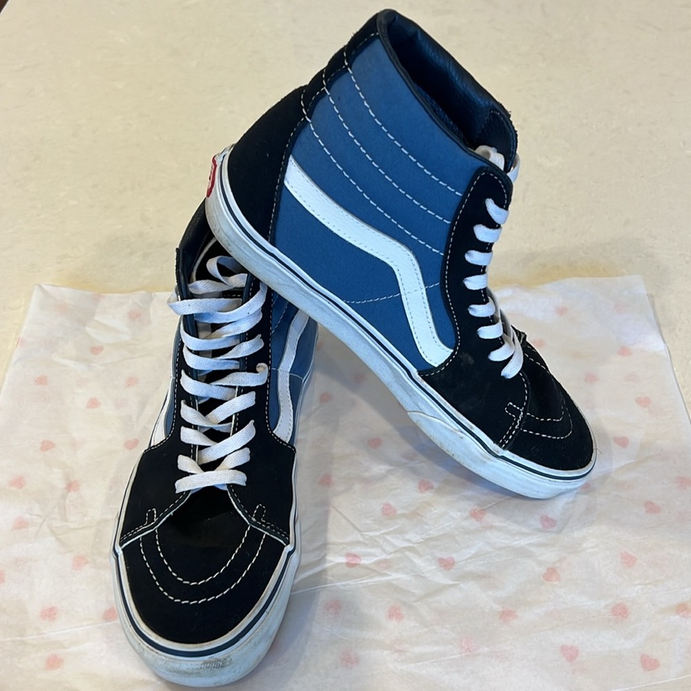 Van’s Sk8-Hi High-tops (size 9 men’s, size 10.5 women’s). Excellent condition!